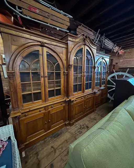Pine cabinets with arched glass doors